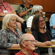 People smiling. Links to Gifts of Life Insurance